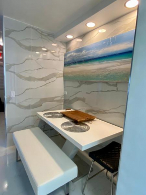 Luxurious remodeled direct Waterfront apartment with Miami skyline view and outdoor terrace Free parking 5min drive to Miami Beach